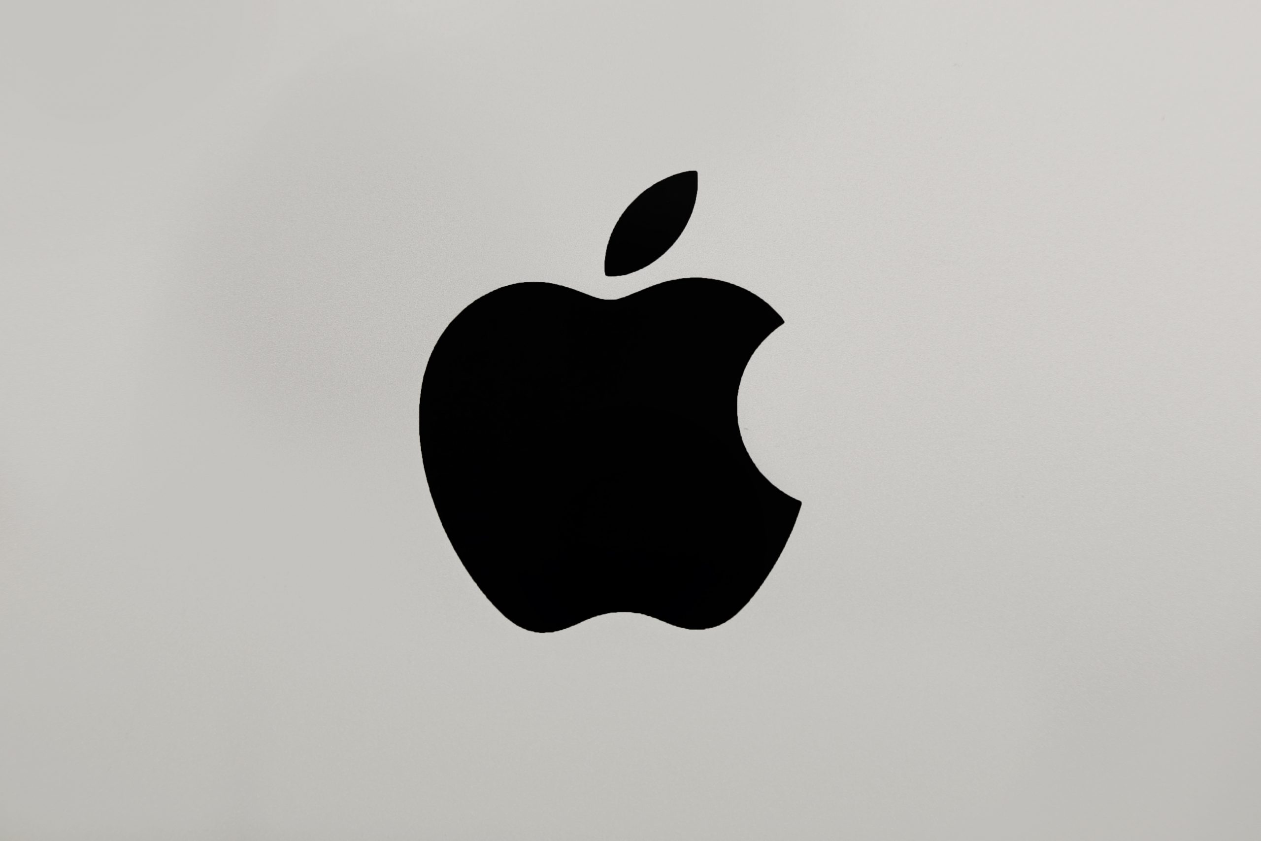 Apple logo on gray background