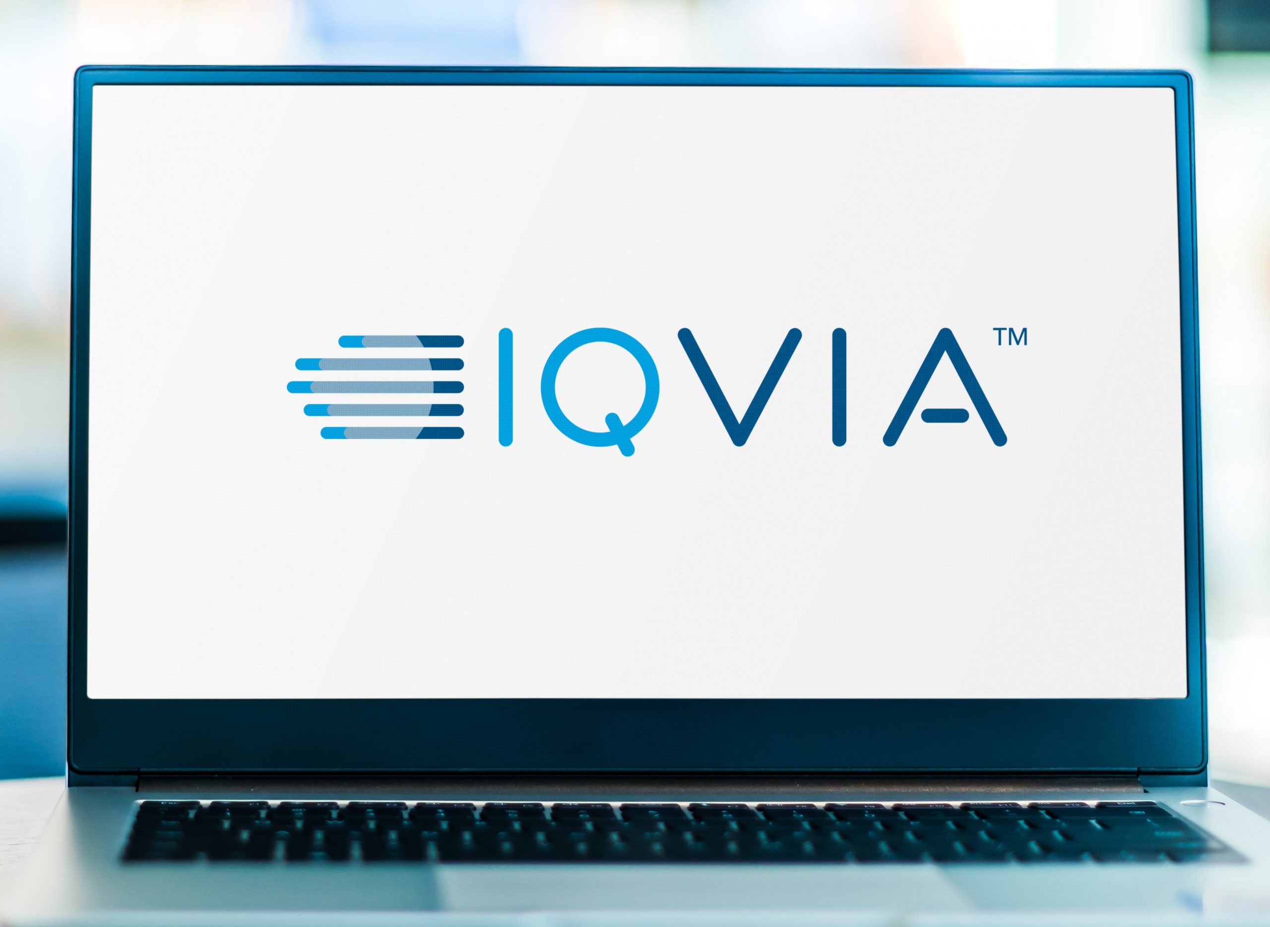Laptop computer displaying logo of IQVIA