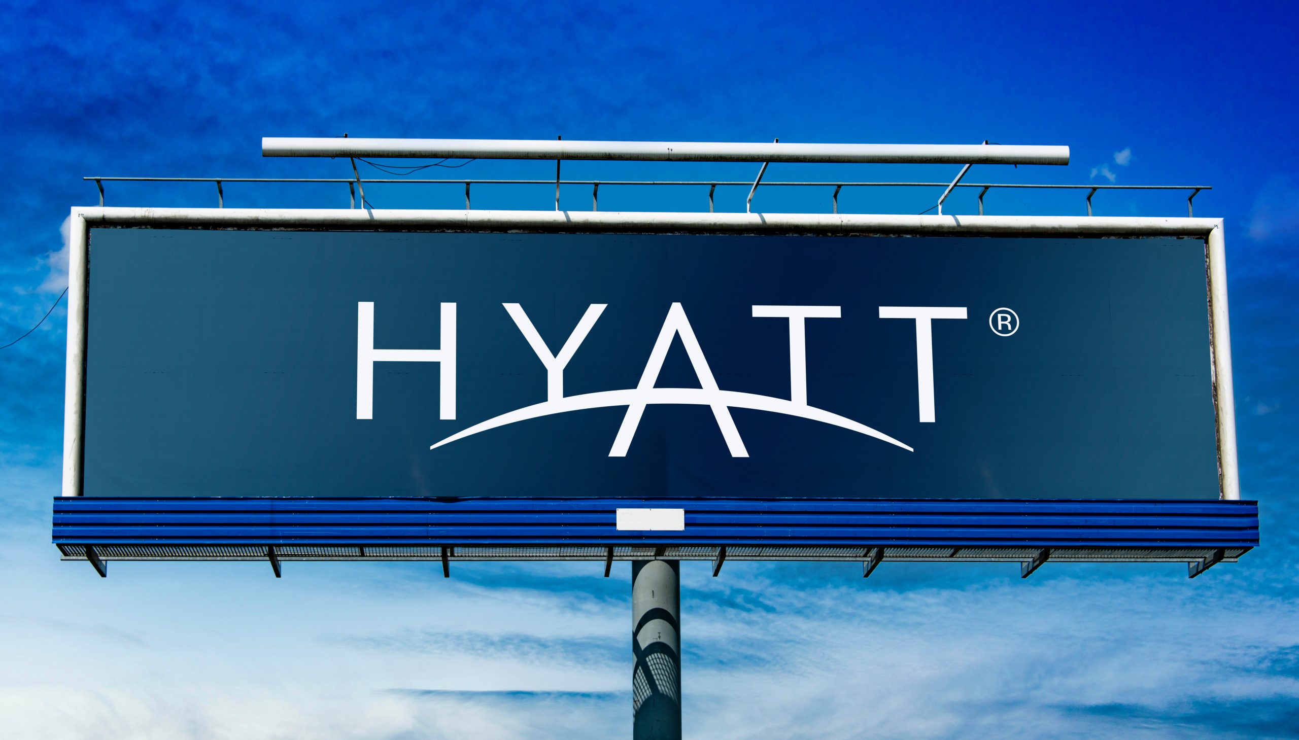 Billboard displaying logo of Hyatt Hotels