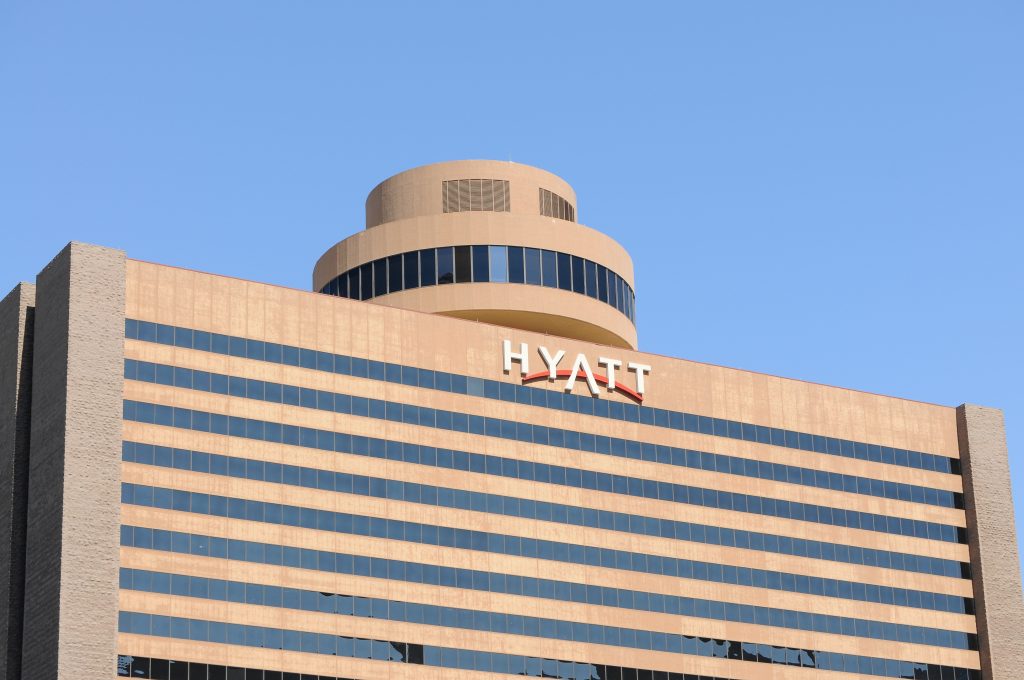 Partial front view of Hyatt Regency Convention Hotel building wi